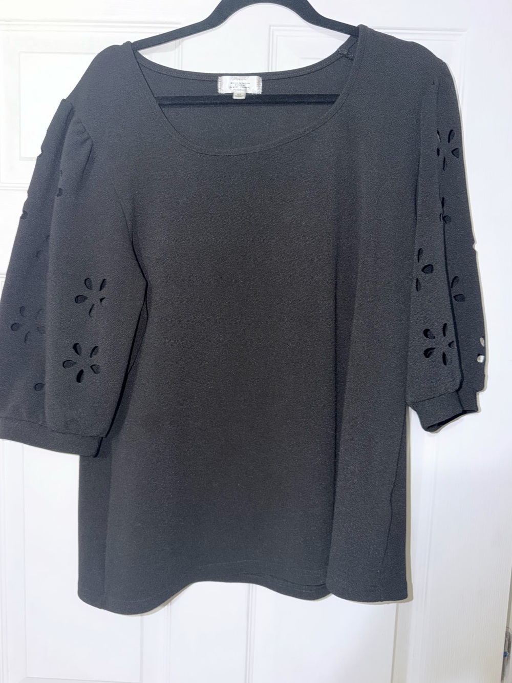 Black blouse with flower cutout